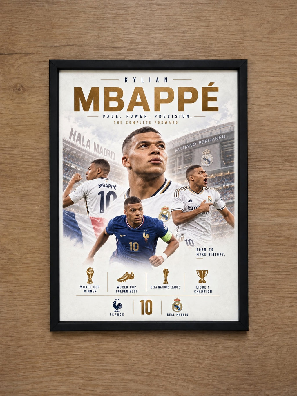 Kylian Mbappé football poster in black frame on a wooden wall